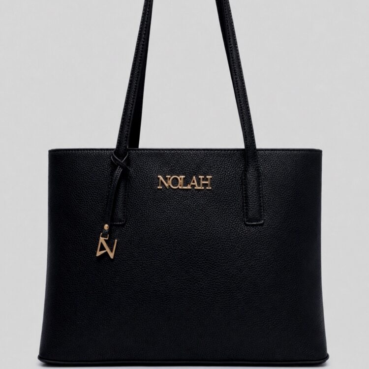 Η Nolah Valia Black είναι μια κομψή γυναικεία τσάντα σε διαχρονική μαύρη απόχρωση που συνδυάζει minimal αισθητική και πρακτικότητα