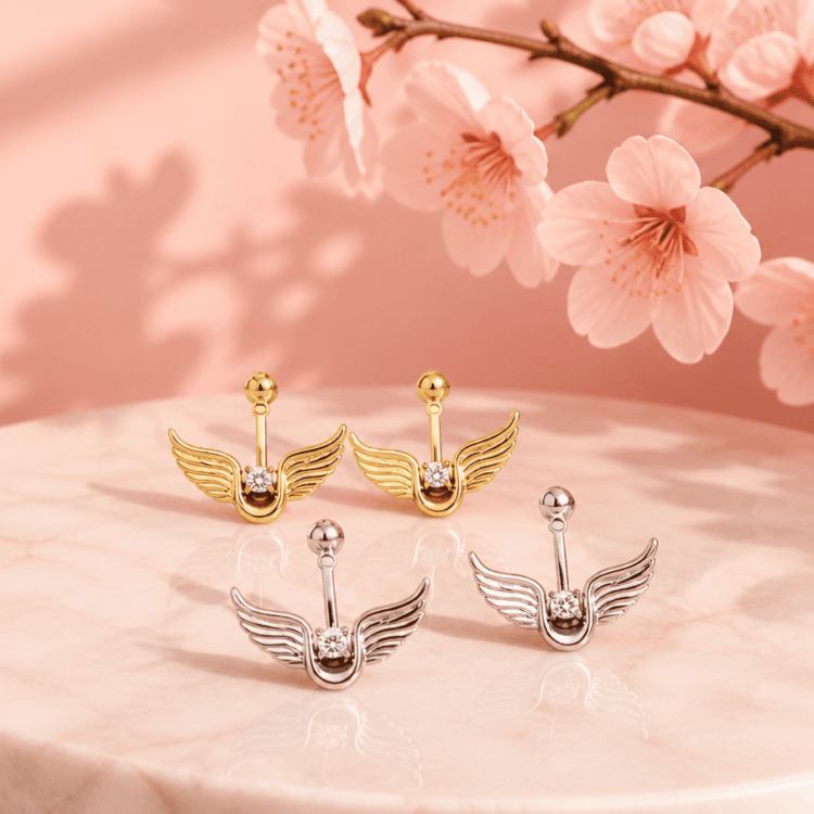Angel Wings σκουλαρίκια από ανοξείδωτο ατσάλι με σχέδιο φτερών και λαμπερό ζιργκόν. Διαθέσιμα σε χρυσή και ασημί απόχρωση για κομψές εμφανίσεις